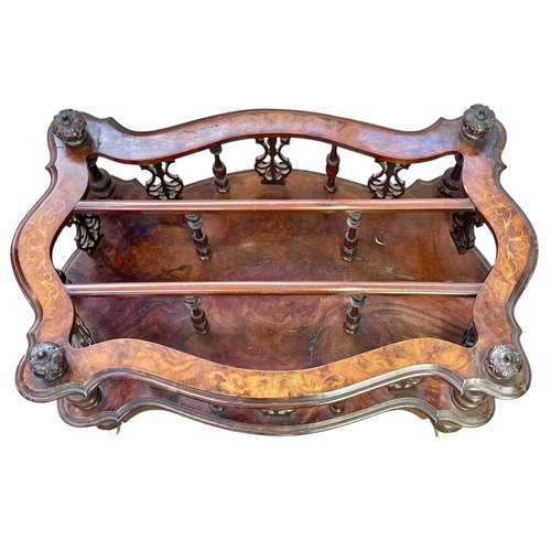 520 - A Victorian walnut serpentine Canterbury or magazine rack. With scroll inlaid top, turned and pierce... 