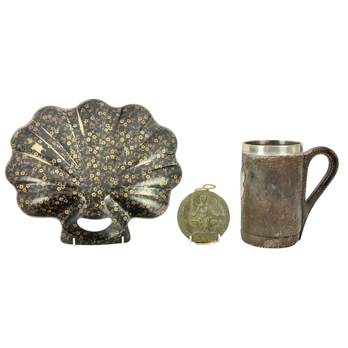 66 - A leather tankard with a sterling silver shield and mount. Height 18cm, with various item of treen i... 