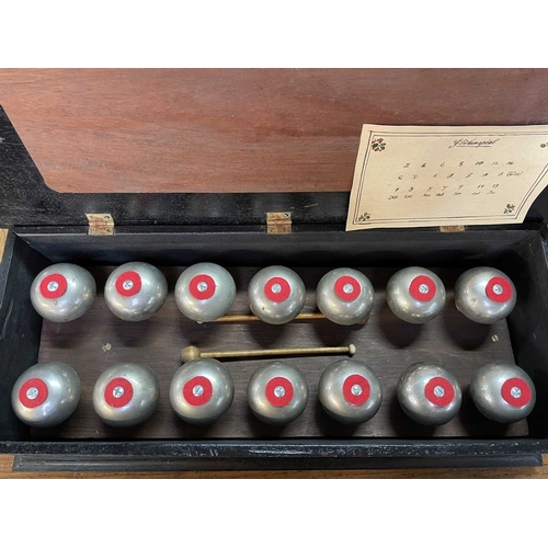 7 - A cased set of Glockenspiel bells Late 19th century, comprising 14 silvered bells contained in a mah... 