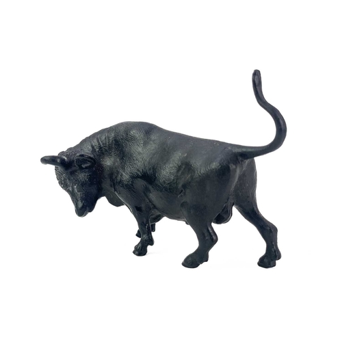 71 - A cold painted bronze figure of a bull. Length 11cm.