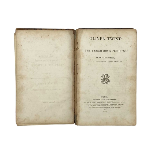 490 - DICKENS, Charles Oliver Twist Brown leather with brown marbled boards, spine is missing, leather is ... 