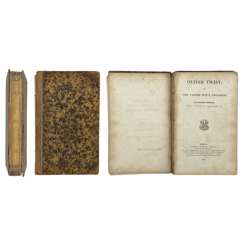 490 - DICKENS, Charles Oliver Twist Brown leather with brown marbled boards, spine is missing, leather is ... 