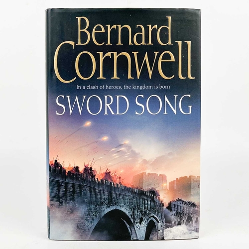 501 - CORNWELL, Bernard Two signed works Sword Song, signed, first edition, Harper Collins, 2007; Azincour... 