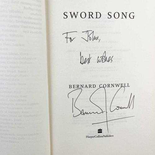 501 - CORNWELL, Bernard Two signed works Sword Song, signed, first edition, Harper Collins, 2007; Azincour... 