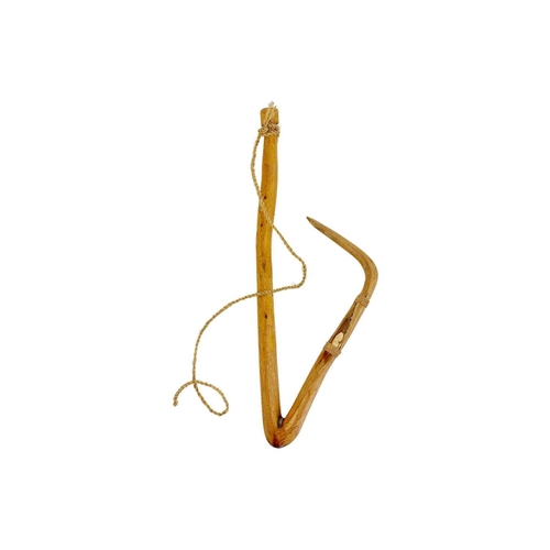 85 - A Tuvaluan (Ellice Islands) fish hook With a hand wove fibre binding, 32cm high, early to mid 20th c... 