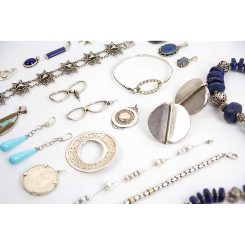 277 - A selection of silver and gem jewellery. Including a boulder opal pendant in silver frame, a Lapis L... 