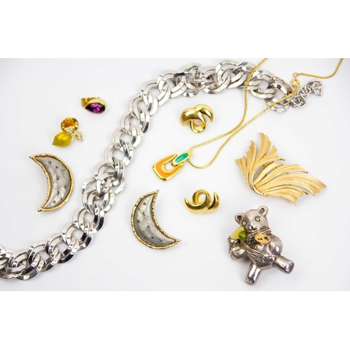 283 - A selection of branded costume jewellery. Including a vintage silver tone double link necklace by 'M... 