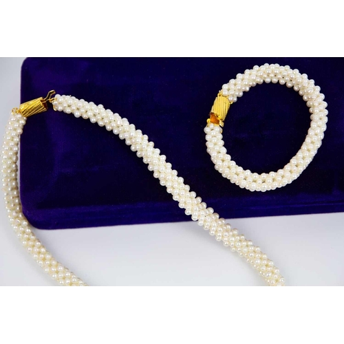 288 - A multi-strand cultured pearl bracelet and necklace set. With gilt metal fluted oval barrel clasp, l... 