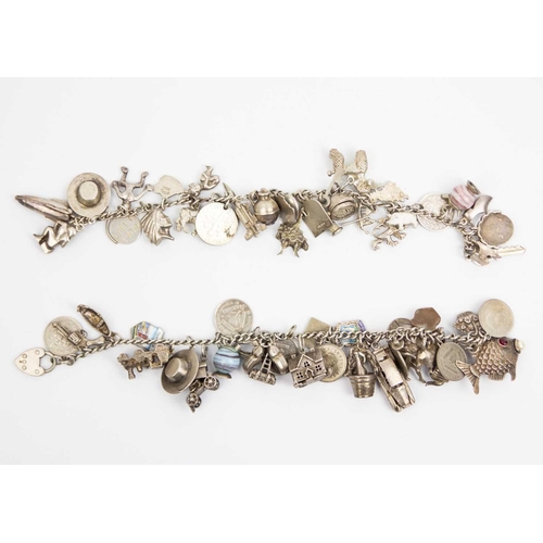 294 - Two silver and white metal charm bracelets. Both applied with numerous charms, total weight 152g.