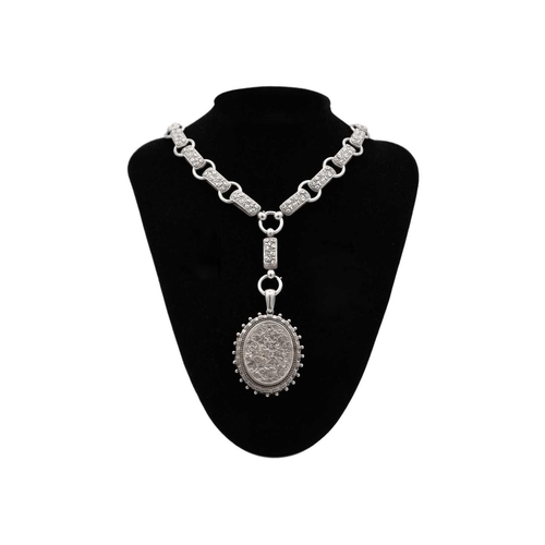 162 - A Victorian silver oval locket pendant on a choker chain by Michael Joseph Goldsmith. The oval locke... 