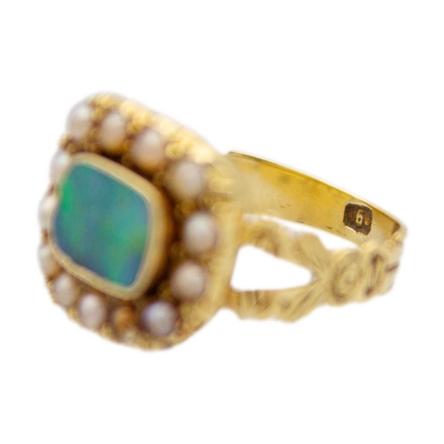 104 - An early 19th-century mourning ring with an opal replacement. The rectangular shape opal cabochon is... 