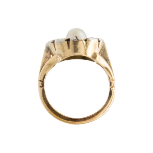 112 - An antique pearl and diamond cluster gold ring. A flower-shape design with rose-cut diamonds on peta... 