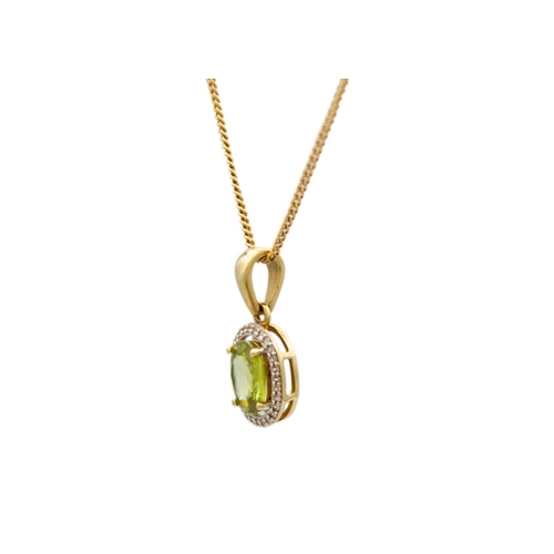 116 - A 9k gold green sphene and zircon halo pendant necklace. The pendant is 11mm x 9mm, 20mm drop; an 18... 