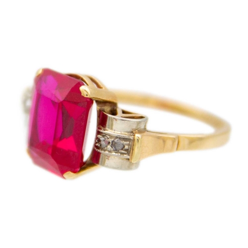 117 - An Austrian vintage 14k synthetic ruby and diamond ring. Of an original design, the rectangular-shap... 