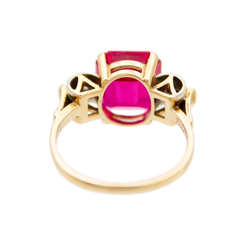 117 - An Austrian vintage 14k synthetic ruby and diamond ring. Of an original design, the rectangular-shap... 