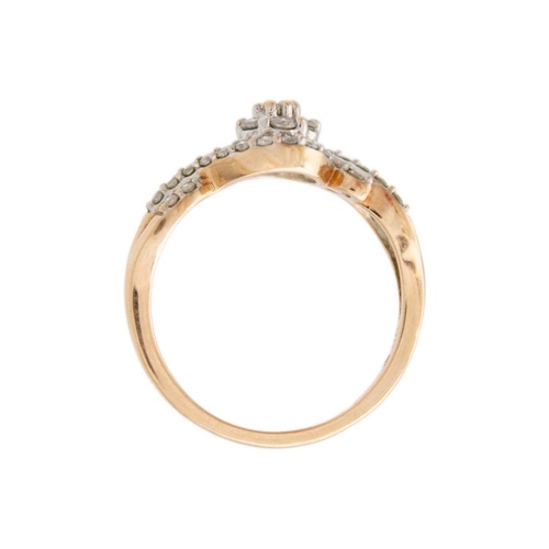 121 - A 9k rose gold diamond cluster ring. Of a crossover design, brilliant cut diamonds are 1.5mm approx,... 