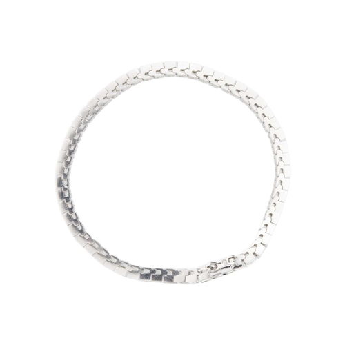 122 - A 14k white gold brilliant-cut diamond line bracelet. Tested 14k, diamonds' total weight 4.85 ct, si... 