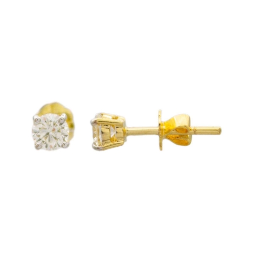 171 - A pair of 18k round brilliant-cut diamond solitaire ear studs. The diamonds of 0.50ct estimated tota... 