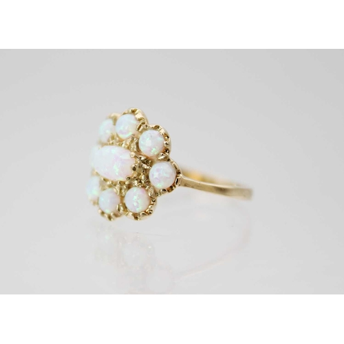 178 - A 9k Victorian-style opal set cluster ring. The opals showing blue and green colours, Birmingham imp... 