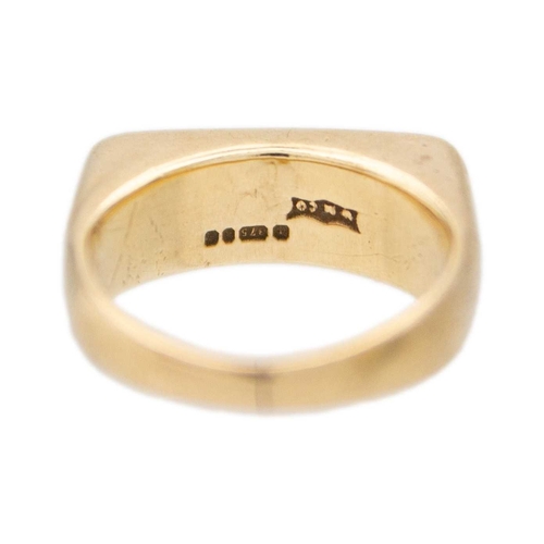 64 - A 9k gold rectangular-shaped ladies' signet ring. London hallmarked, size F, weight 4.86g.