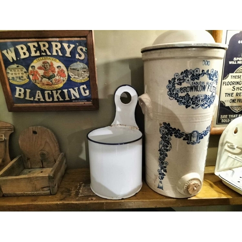 108 - ± Clemence's Ironmongers Enamel wares etc A shelf of enamel wares including soap stand,seive,oil jar... 