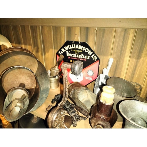 124 - ± Clemence's Ironmongers Mixed kitchen iron wares A part shelf of mixed iron wares to include 