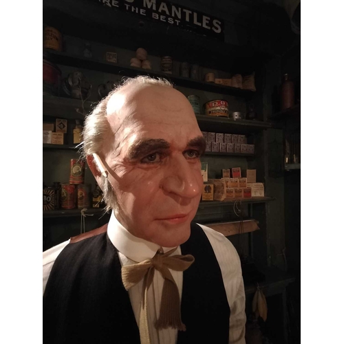 144 - ± Clemence's Ironmongers Wax figure A floor-standing figure of Mr Clemence the shopkeeper with wax h... 