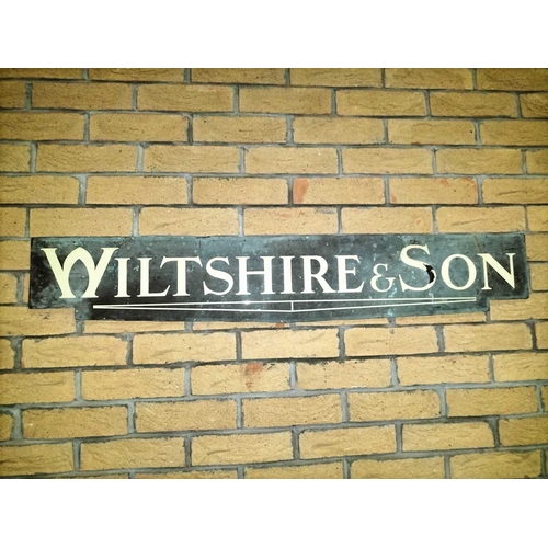 205 - ± Wiltshire & Son Blacksmiths Brass and enamel shop signs A pair of shaped brass and enamel signs wi... 