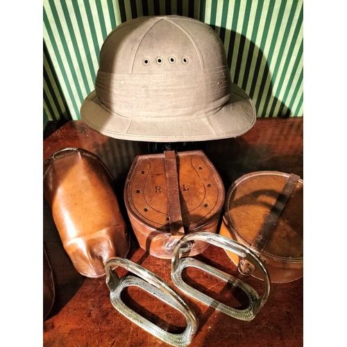 241 - ± Lewis & Bull Military Tailors Militaria etc A British Military Pith Helmet on turned wood stand to... 