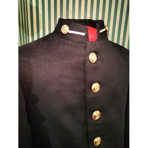 242 - ± Lewis & Bull Military Tailors Militaria A Midshipman's jacket on a brass and ceramic torso stand t... 