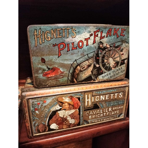 263 - ± M King Tobacconist Tobacco Tins and Boxes Three shelves of cigarette and tobacco tins and boxes, a... 