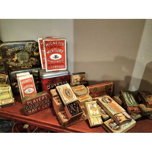 264 - ± M King Tobacconist Tobacco and Cigarette Tins, Pipe Bowls etc Two shelves of Tobacco and Cigarette... 