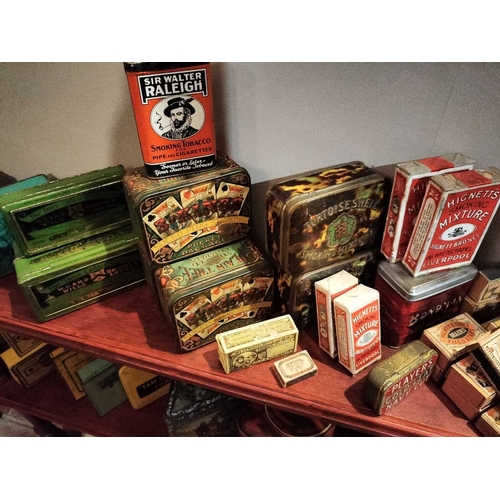 264 - ± M King Tobacconist Tobacco and Cigarette Tins, Pipe Bowls etc Two shelves of Tobacco and Cigarette... 