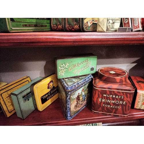 264 - ± M King Tobacconist Tobacco and Cigarette Tins, Pipe Bowls etc Two shelves of Tobacco and Cigarette... 