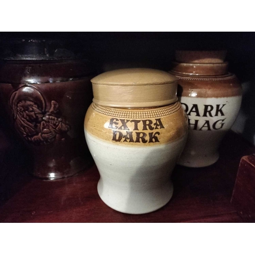 277 - ± M King Tobacconist Six tobacco jars Six jars pottery,stoneware and tin highest 23cm