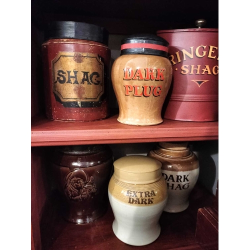 277 - ± M King Tobacconist Six tobacco jars Six jars pottery,stoneware and tin highest 23cm