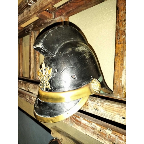 308 - ± Flambards Fire Station Six items from the Fire Station A leather and brass fireman's helmet, a lea... 