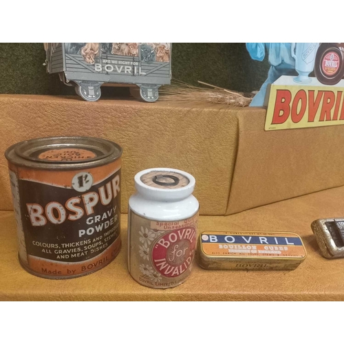 1016 - ± Bovril Advertising Bovril cardboard advertising, together with various Bovril tins and bottles Inc... 