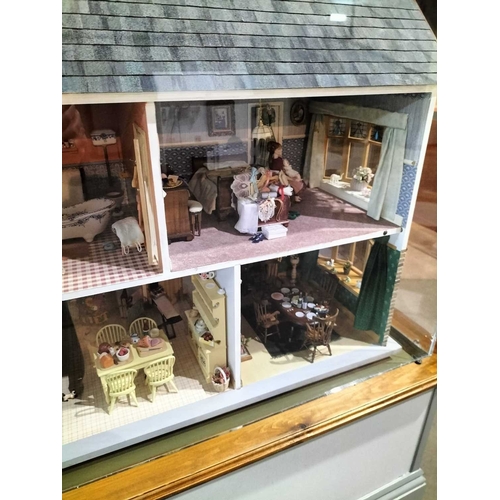 1087 - ± Entrance Dolls House A large model Dolls house with display case and stand Height overall 171 cm D... 