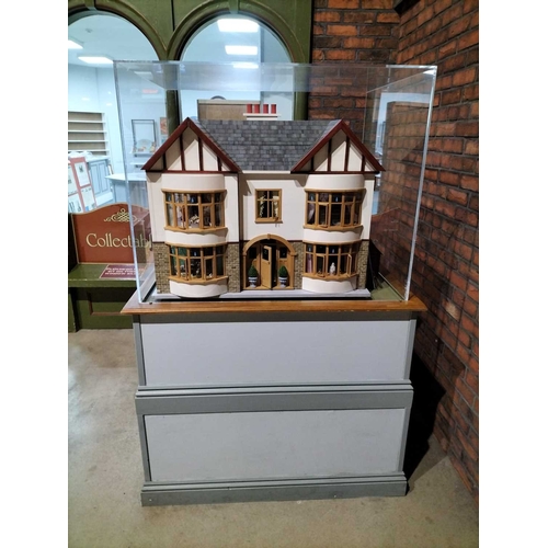 1087 - ± Entrance Dolls House A large model Dolls house with display case and stand Height overall 171 cm D... 