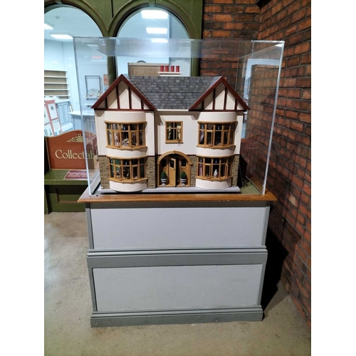 1087 - ± Entrance Dolls House A large model Dolls house with display case and stand Height overall 171 cm D... 