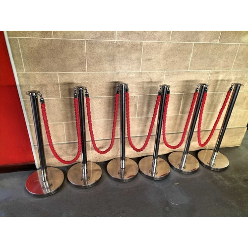 1112 - ± Entrance Barrier A set of six chromed metal and rope barrier posts - This lot will be subject to a... 