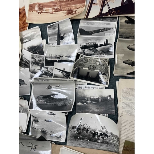 1113 - ± Entrance RAF Ephemera. A collection of mostly post-war RAF photographs of aircraft, a group of gro... 