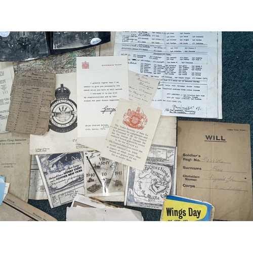 1115 - ± Entrance WWII Ephemera. A collection of WWII ephemera to include maps, original & copy photos & do... 