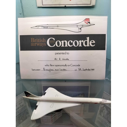 1139 - ± Concorde Concorde display A display case contents recording flight events as well as ephemera and ... 