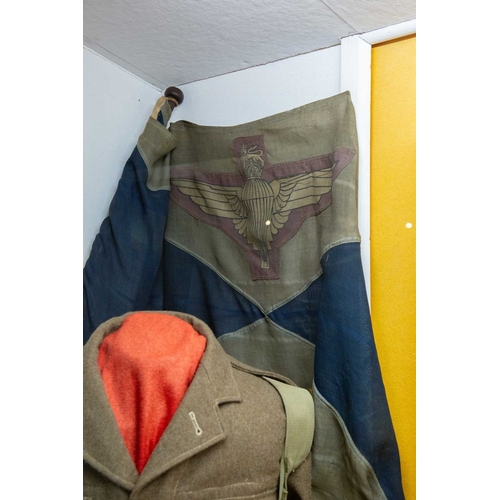 1176 - ± The War Gallery Arnhem The Arnhem display case contents to include,Parachute Regiment flag, unifor... 