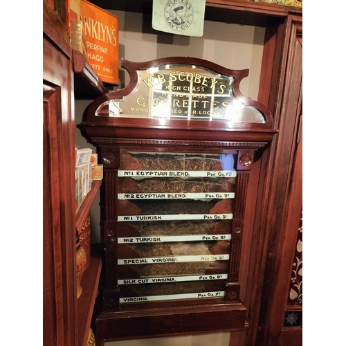 276 - ± M King Tobacconist W B SCOBEY,S TOBACCO DISPENSER A good wall mounted tobacco dispenser, fitted wi... 