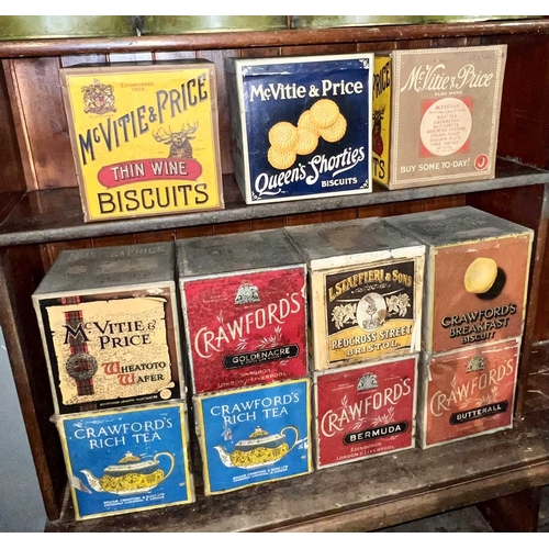 333 - ± Birch, Birch & Co Grocers Display biscuit tins Eleven tins 23cm cube approximately - This lot will... 