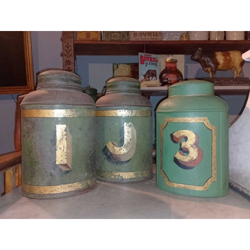 334 - ± Birch, Birch & Co Grocers Tea cannisters A pair by Bartlett with original decoration and domed lid... 