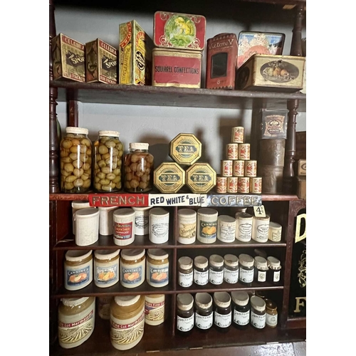 357 - ± Birch, Birch & Co Grocers Tins, Jars and a shelf advert Numerous tins and jars, nearly all empty (... 